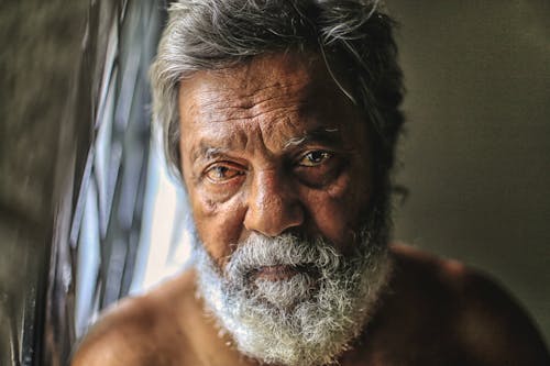 Shirtless Elderly Man With Beard