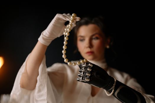 Woman Holding a String of Pearls