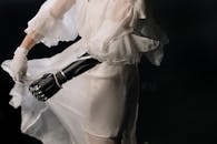 Woman in White Dress Wearing Black Leather Strap Silver Watch