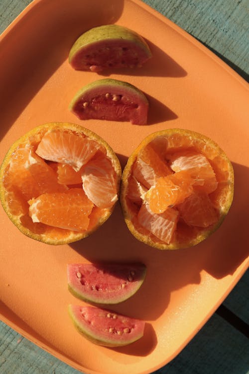 Close-Up Shot Oranges on a Plate