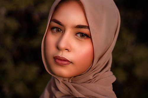 Portrait of a Pretty Woman in Brown Hijab 