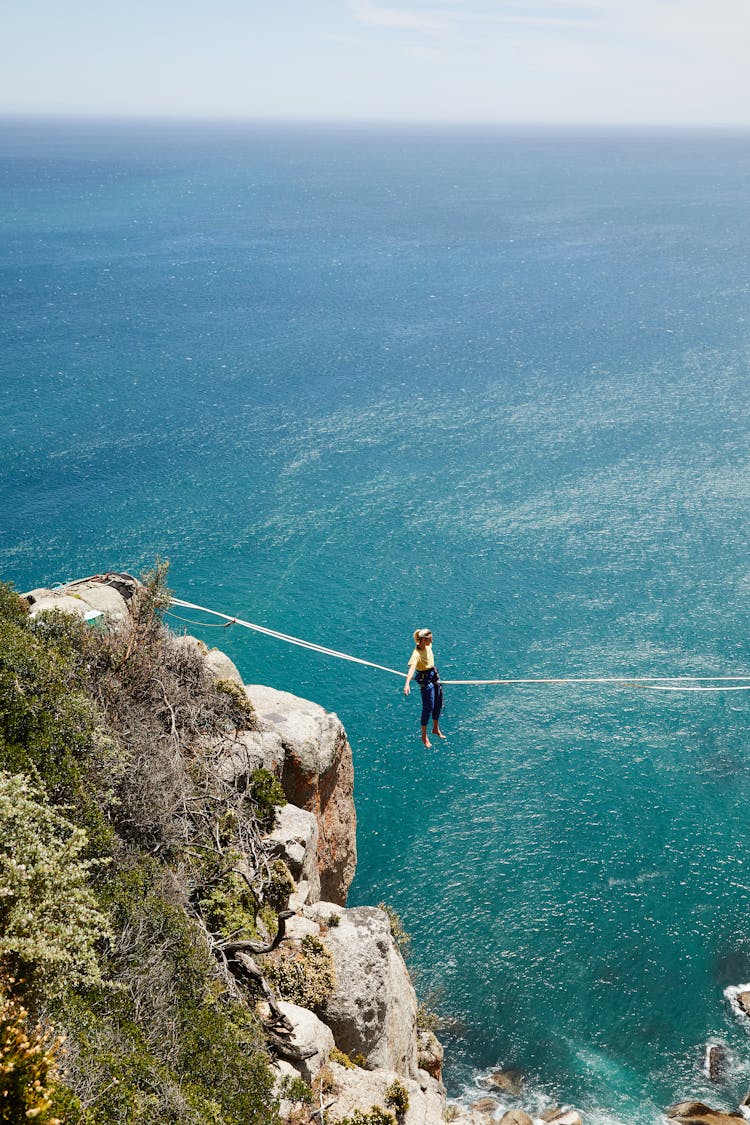 Unrecognizable Woman Sitting On Zipline