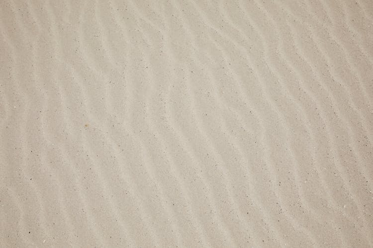 Sandy Surface Of Beach In Daytime