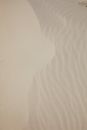 White sandy surface on sea shore