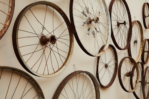 Spoke wheels hanging on wall