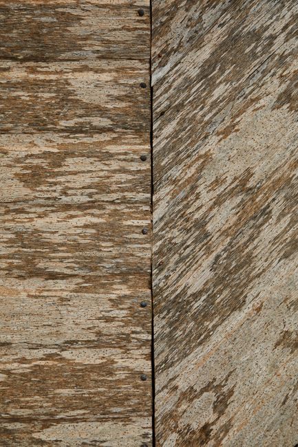 Abstract background of rough worn out wooden surface with scratches and rubbed texture