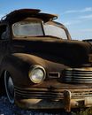 Old fashioned car with round headlights
