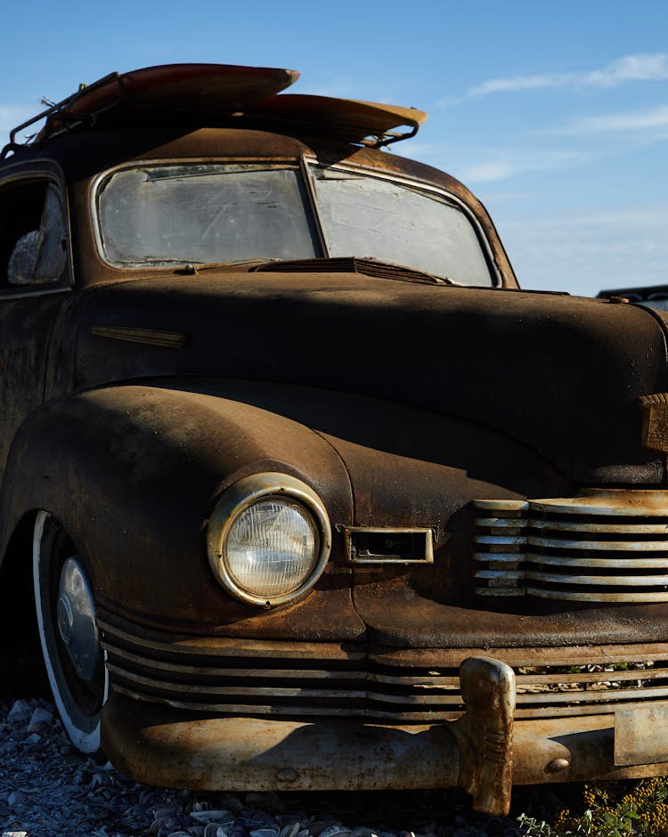 Old Fashioned Car With Round Headlights