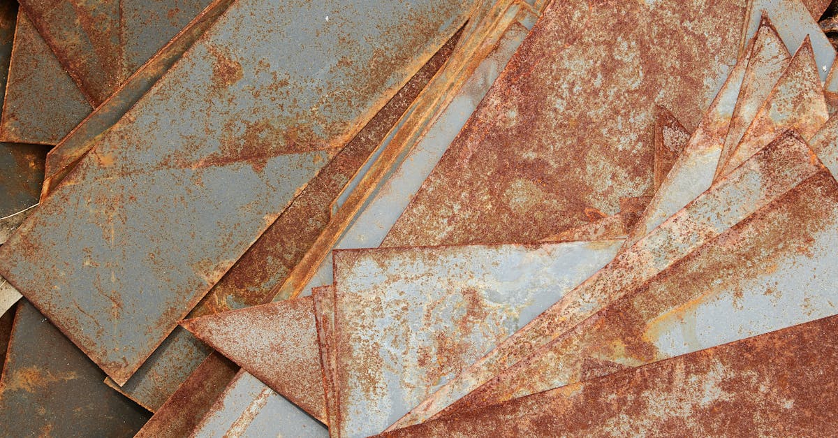 How is steel manufactured from iron ore