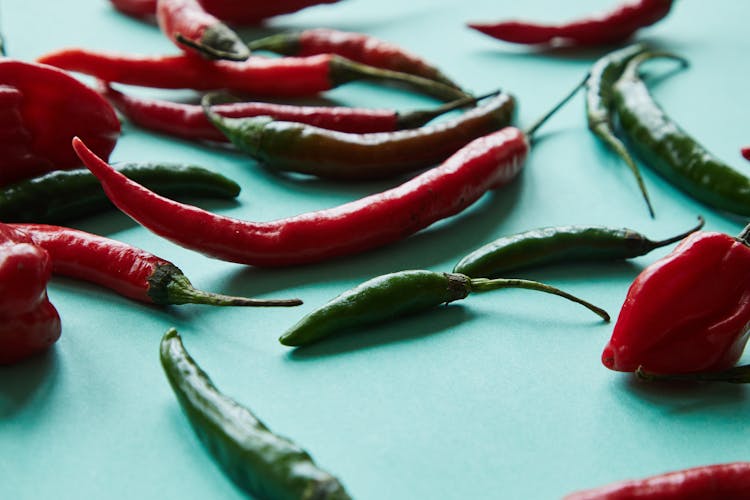 Heap Of Fresh Green And Red Chili Peppers