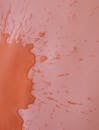 Blob of red liquid with drop