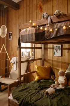 Warm and inviting rustic bedroom decorated with festive string lights, ideal for a Christmas setting.