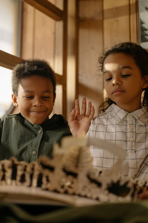 Two Kids Reading a Fairy Tale Book