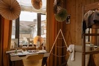 White and Brown Wooden Table and Chairs