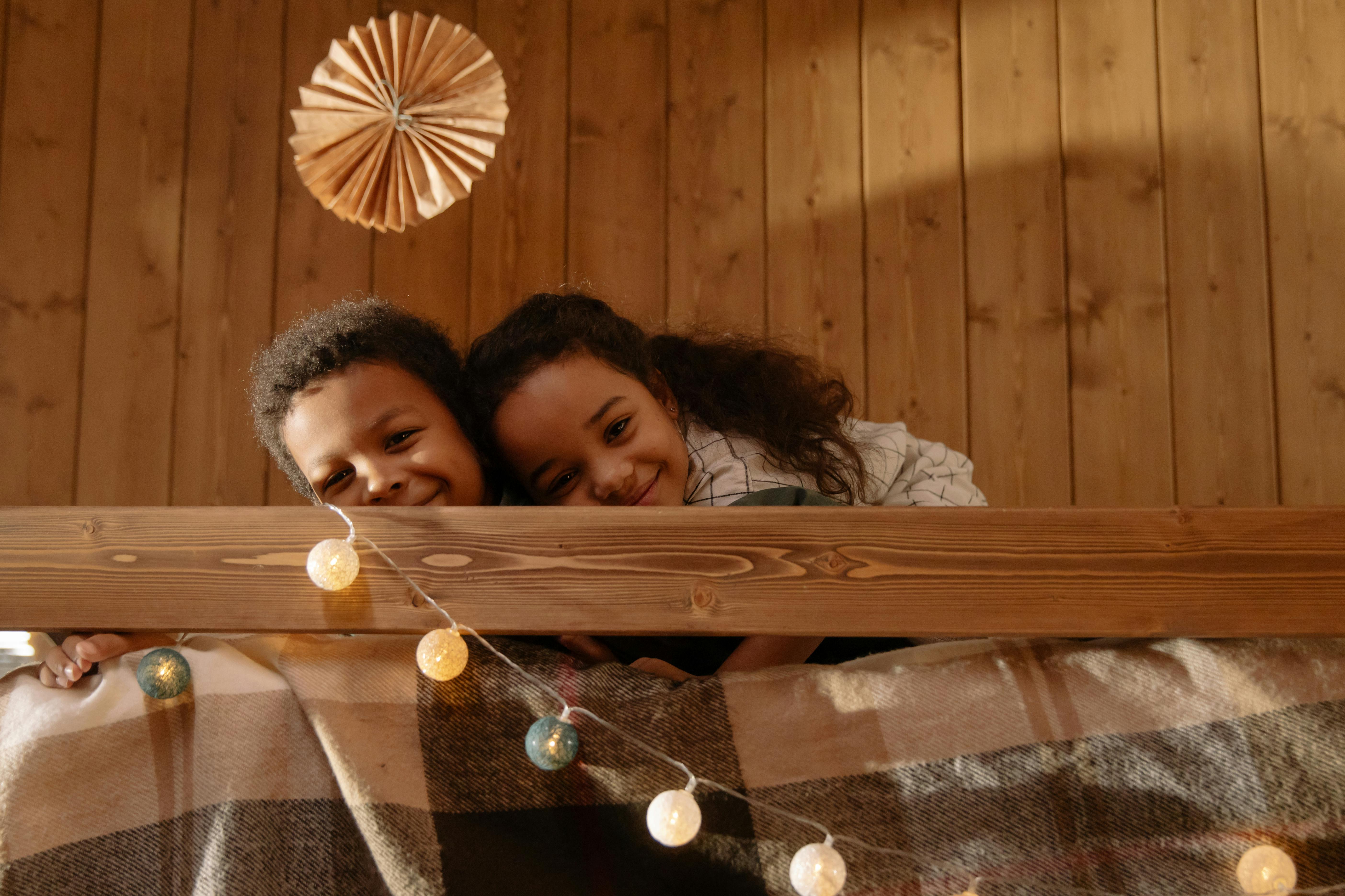 kids playing together in bedroom