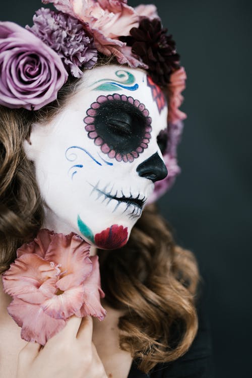 Close Up Photo of Person with Face Paint