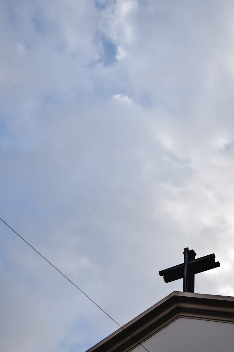 Cross Under White Clouds