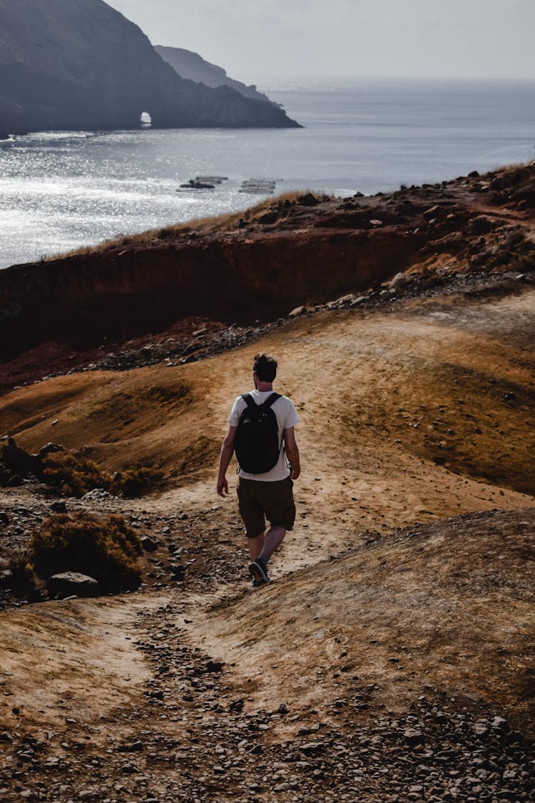 Man Hiking On Mountain