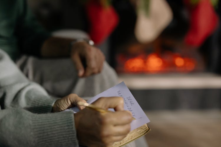 Person Writing A Letter