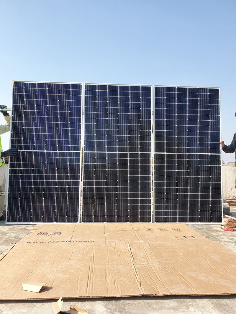 Solar panels on vast warehouse roof