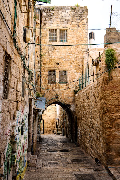Free Vertical Shot of an Old Town Stone Buildings Stock Photo
