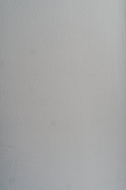 Free Background of rough gray wall in daytime Stock Photo