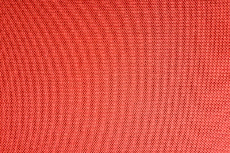 Textured Background Of Red Fabric With Rough Surface