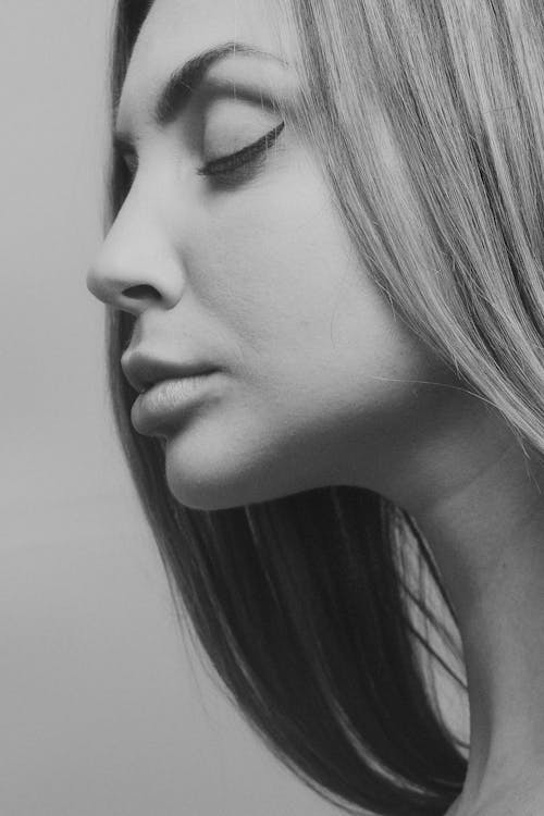 Grayscale Photography of a Woman's Side Face
