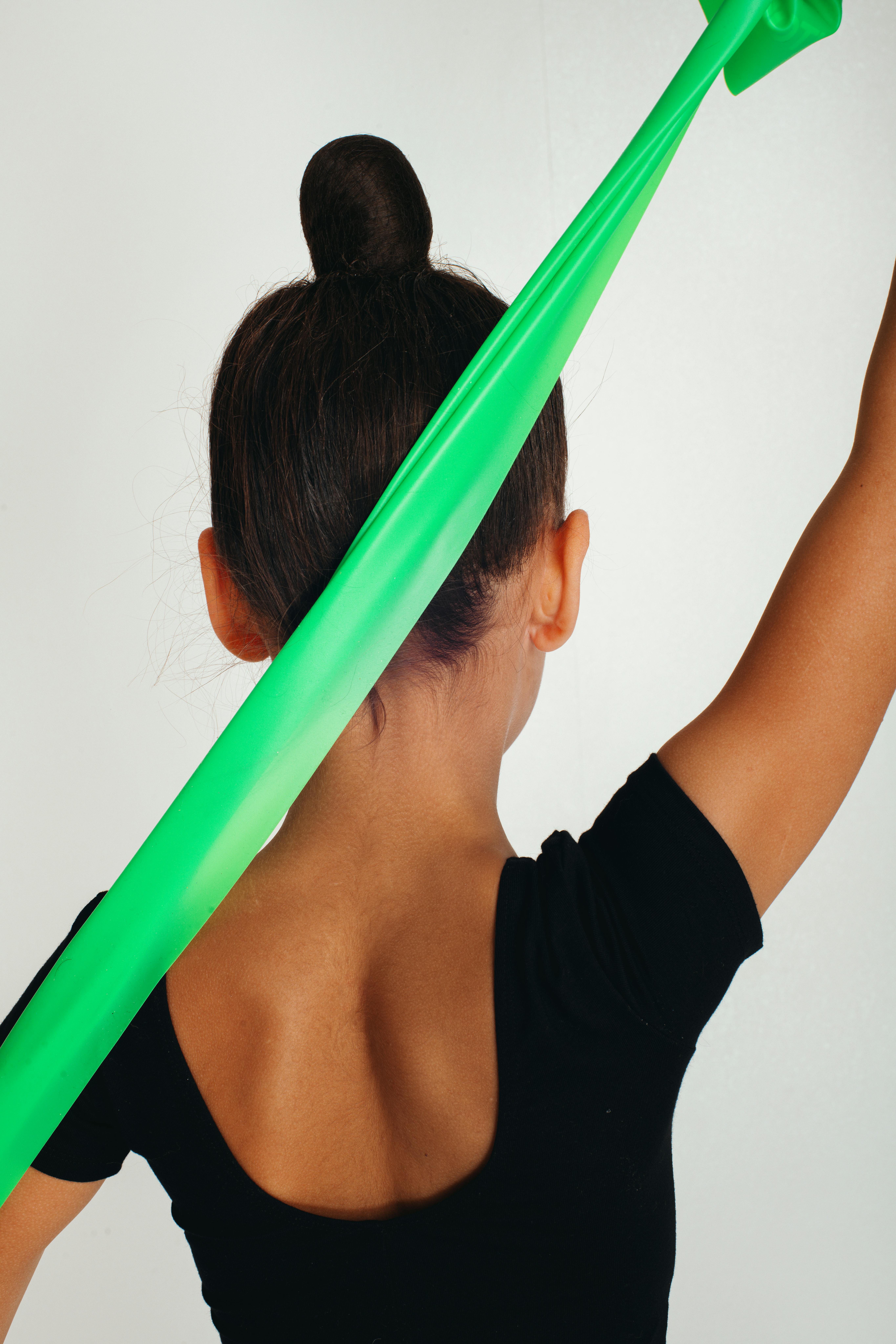 Girl Stretching with Tape · Free Stock Photo