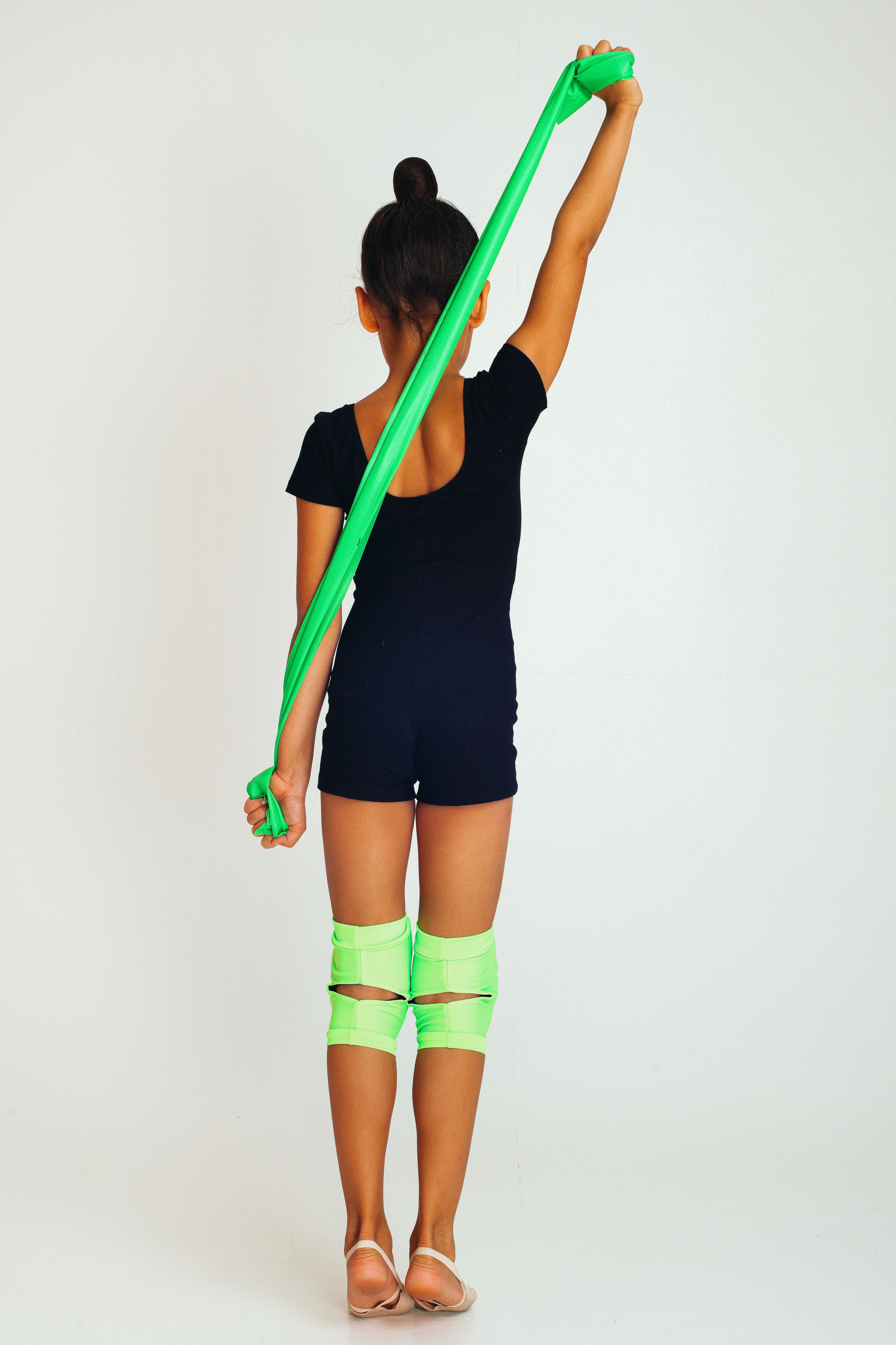 Little girl with green ribbon · Free Stock Photo
