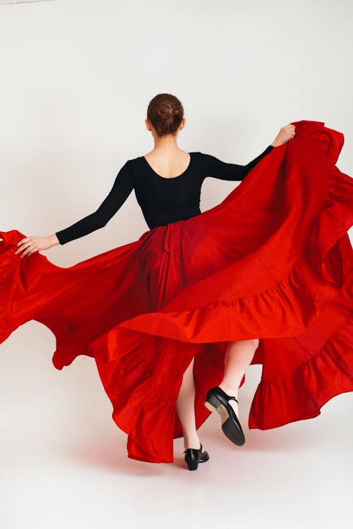 Free Woman Waving Her Flamenco Dress Stock Photo