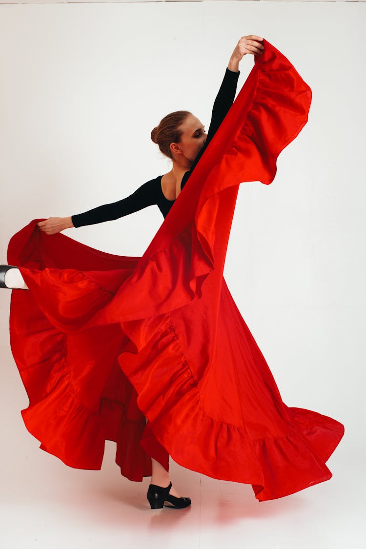 Elegant Flamenco Dancer In Red Skirt