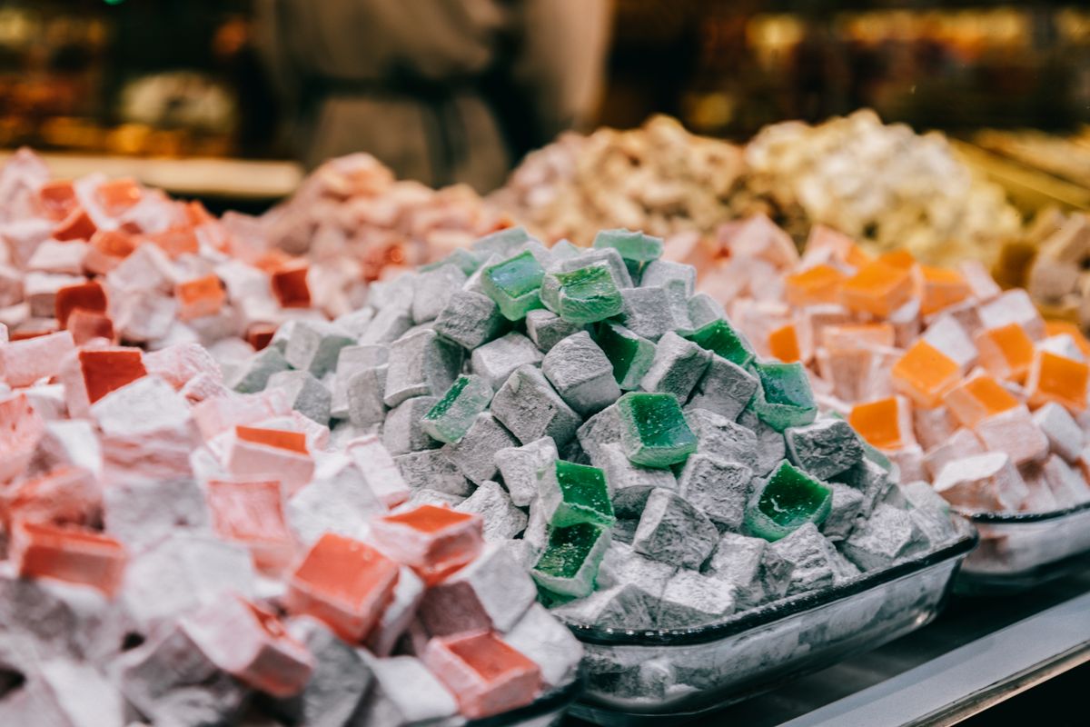 Variety of sweet Turkish delight gelatinous confection made of syrup and cornflour dusted with icing sugar