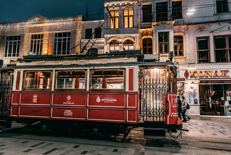 Old Tram Riding On Railroad At Night