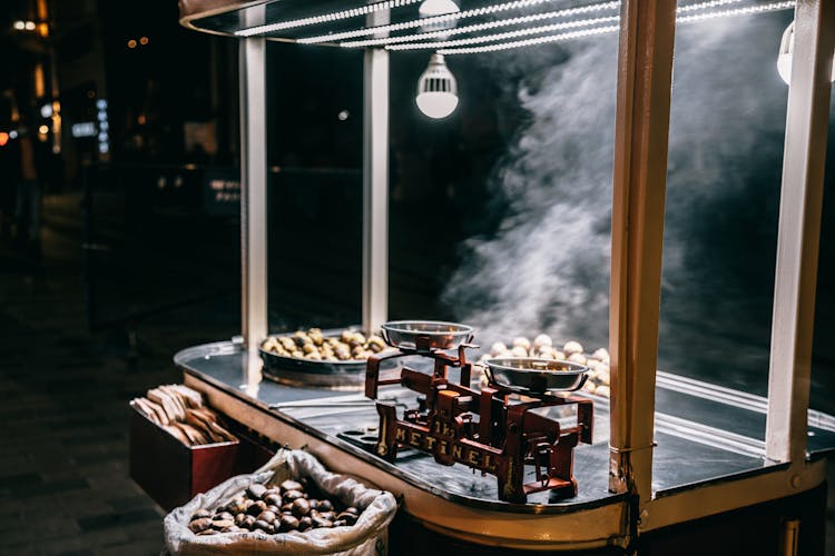 Roasted Chestnuts Selling In Food Cart On Street