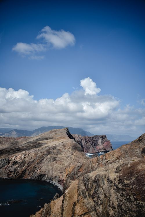 Free Stunning cliffs and coastline in Madeira, Portugal under a bright blue sky. Stock Photo