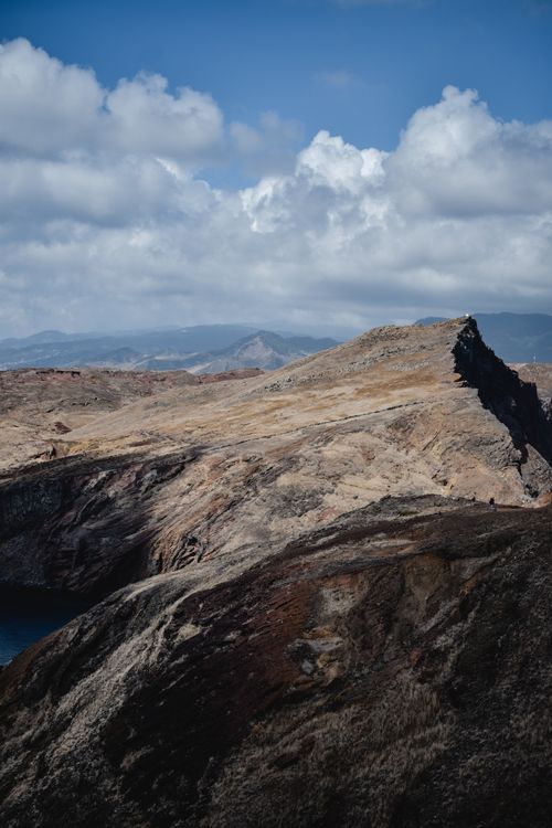 Free Explore the rugged beauty of Madeira's mountainous terrain under a cloudy sky. Stock Photo