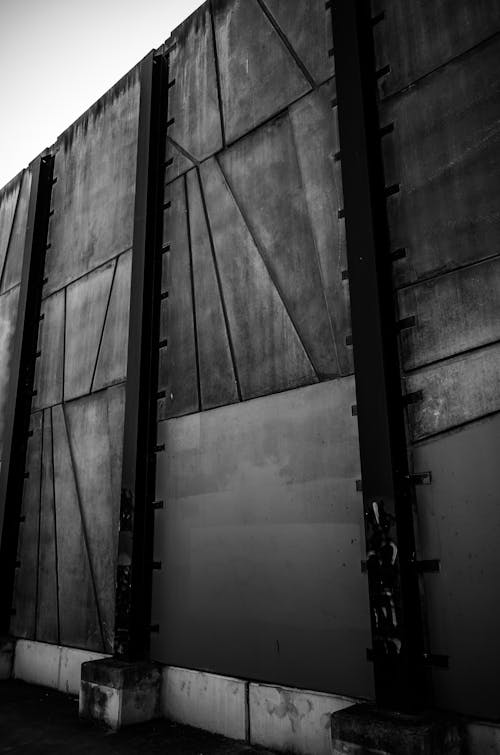 Black Steel Wall in Grayscale Photography