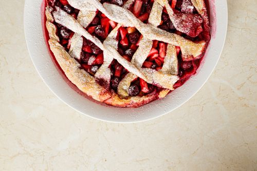 Free Freshly baked cherry apple pie with a lattice crust, dusted with powdered sugar. Stock Photo