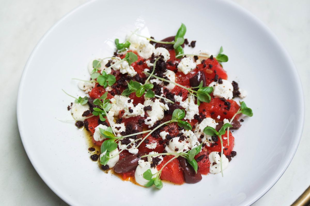 Roasted red peppers topped with whipped feta, kalamata olives, olive crumble and pea shoots