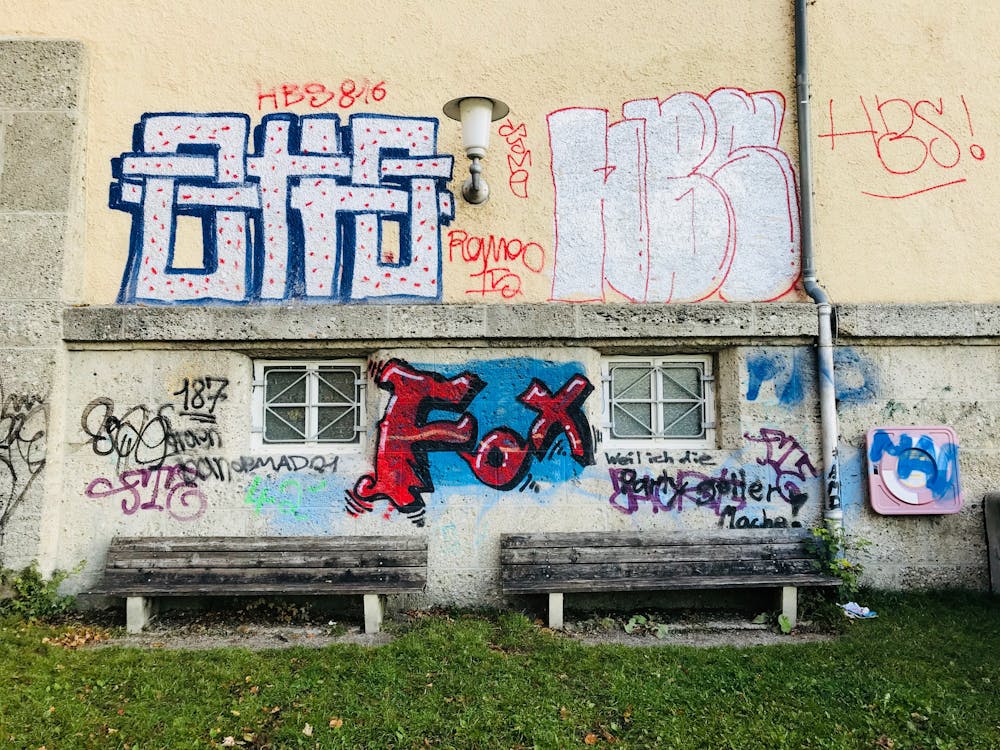 Free stock photo of bench, brick wall, graffiti