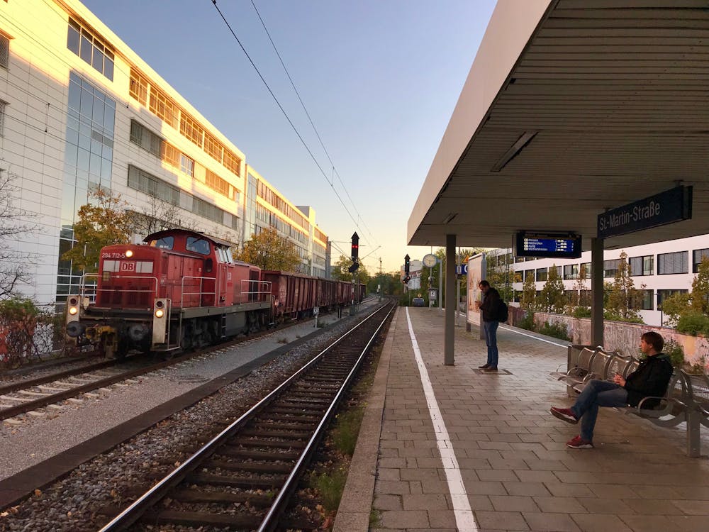 Free stock photo of bench, red train, subway platform