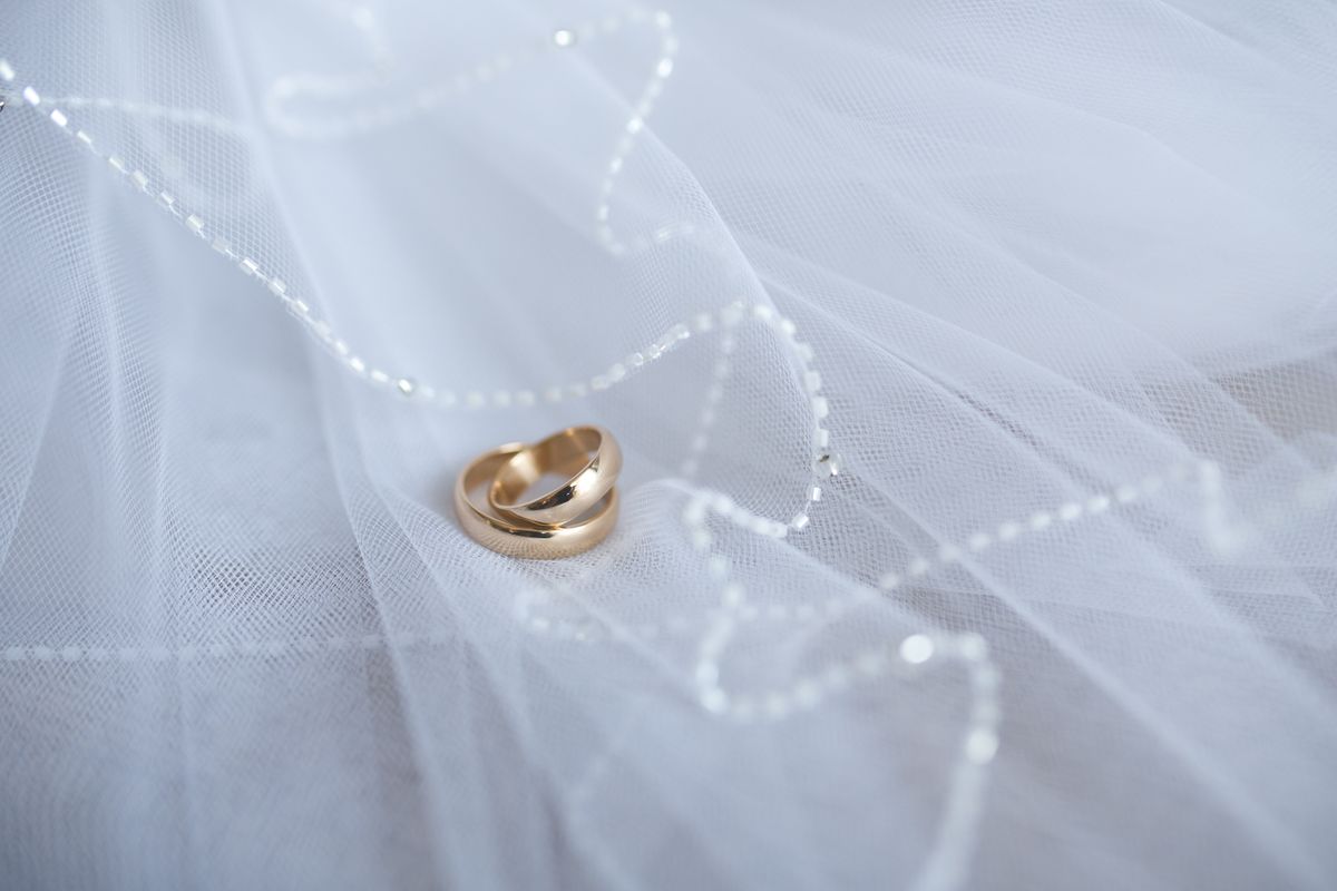 Wedding rings on a veil for a bridal shower ring hunt