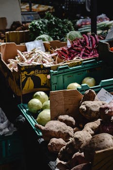 Colorful assortment of fresh vegetables at Funchal Market, Madeira. Perfect for illustrating local agriculture.