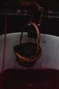 Brown Woven Basket on White Plastic Container