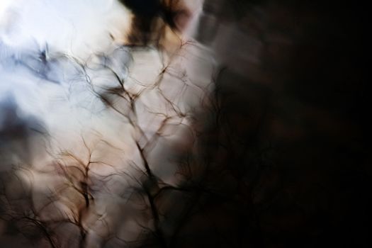Thin black blurred lines of abstract background with dim and bright light and reflection