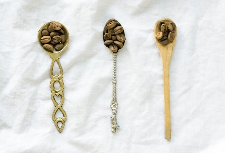 Coffee Beans On Spoons 