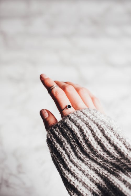 Free Silver Rings on the Person's Index Finger  Stock Photo