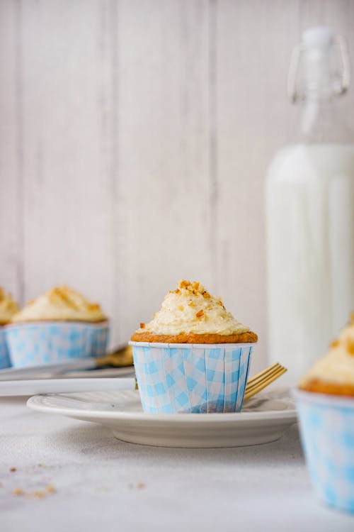 Free Cupcake on White Ceramic Plate Stock Photo