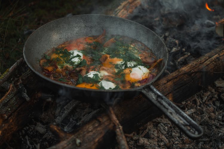 Omelette Dish On A Black Pan 